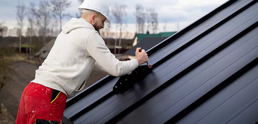 Tin Roof Ridge Cap Installation in Cambridge